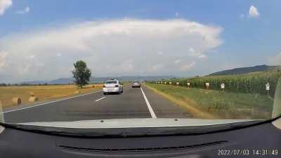 Driver tries to overtake at the wrong spot and gets instant karma