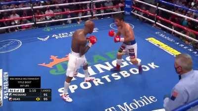 Yordenis Ugas lands his signature looping right hand against Manny Pacquiao