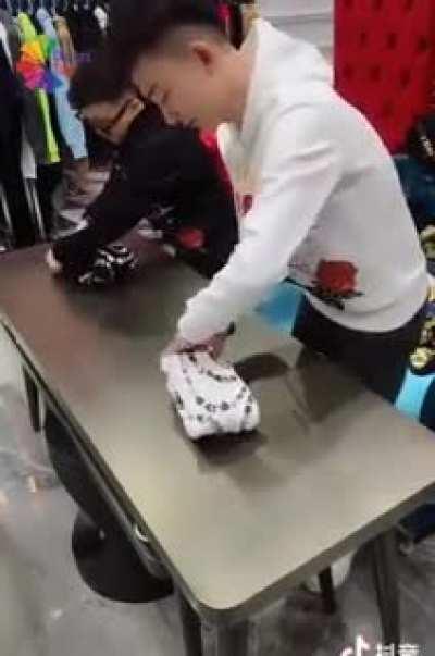 Folding t-shirts (ended filming too early)