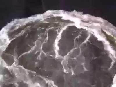 Massive surge tank at a hydroelectric power plant.