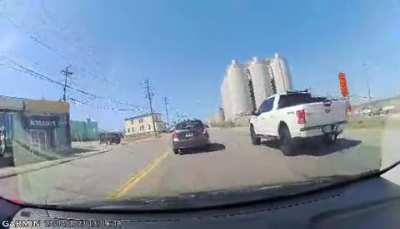 Car cut off motorcycle 