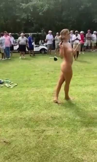 Playing golf nude in front of a crowd
