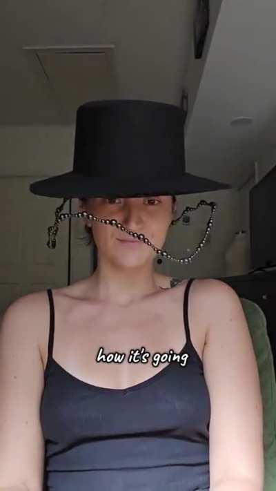 Moving ball fringe hand-crafted hat.