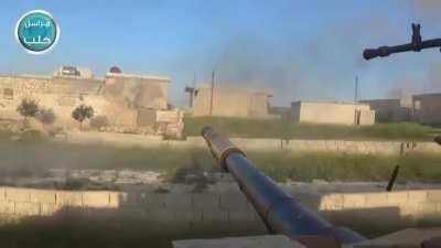 [Combat edit] Jabhat al-Nusra armored assault on loyalist-held Tel Eis in S. Aleppo countryside in April, 2016. Multiple SVBIEDs, Tank GoPro, artillery & more