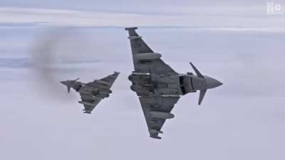 Italian Air Force EF2000 Typhoon fighter and French Air Force Dassault Rafale fighter performing Baltic air surveillance mission together. 