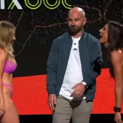 Rare kiss during a face off. Amber O’Donnell and Whitney Johns.