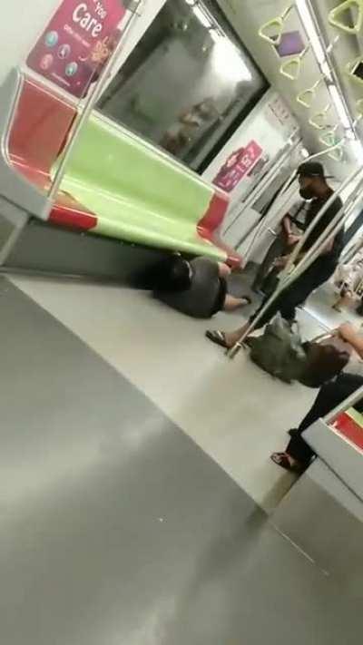 Someone is attacked on MRT.