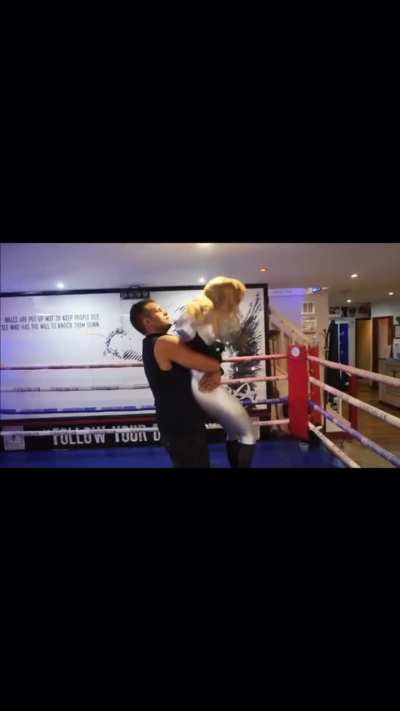 Superheroine destroyed in bearhug