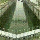 Ships fitting into a canal gate