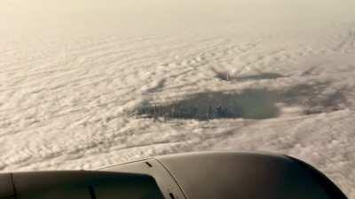 NYC Skyline Peeking Over the Fog