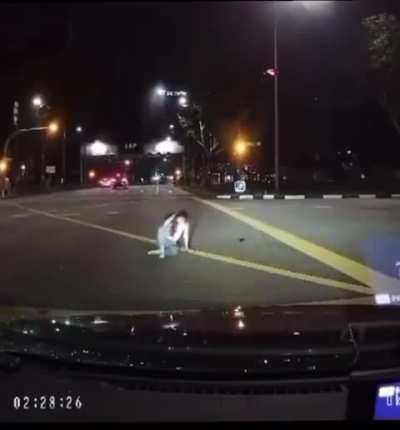 Driver hits pedestrian who’s crossing the intersection against the light while on her phone