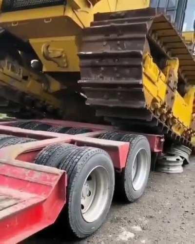 Using stacked car rims to put a tracker on a trailer