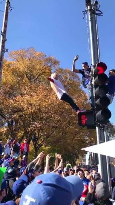 Standing on a traffic light
