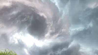 A rare view of a tornado forming while being underneath it!