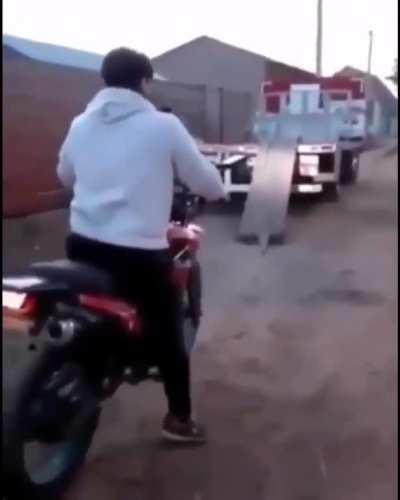 WCGW trying to load your bike into a truck by yourself