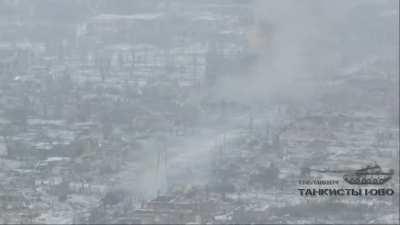 Drone video showing a Russian T-90M tank engaging a Ukrainian Infantry position in a ruined village before falling back at a unknown location, Early January 2023. (Music is from Source)