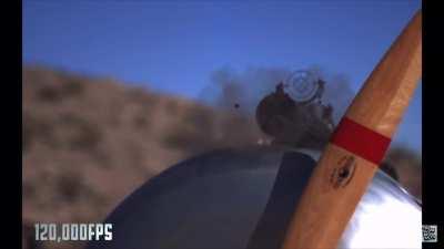 WW1 & 2 planes used a special synchronization mechanism for prevent shooting into the propeller. Weapon is connected to the engine and fired in the gaps between blades.