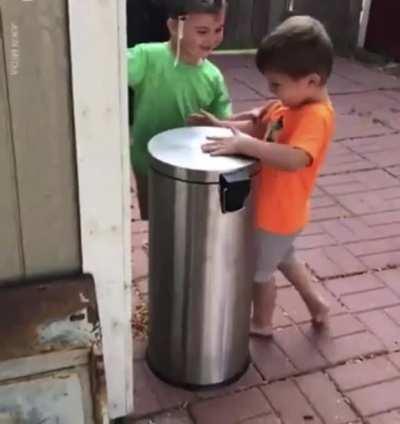 These kids smashing their heads on a trash bin because of the funny sound it makes