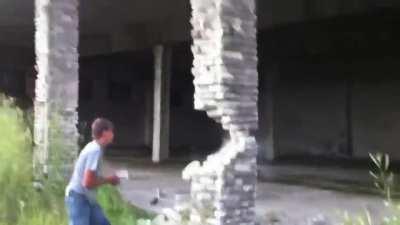 Guy collapses building