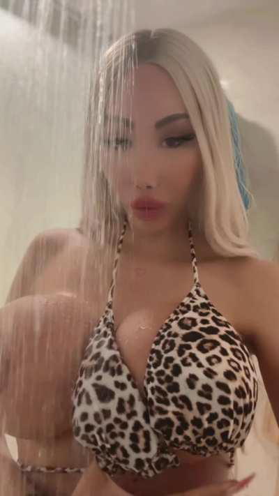 I love spraying my big fake tits with water