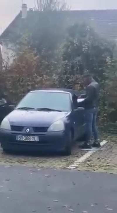 Lighting lady's car on fire for no reason