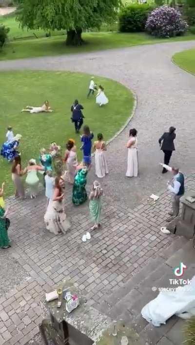 Funniest bouquet toss I've seen.
