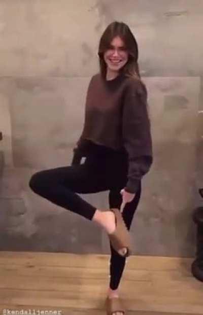 Shows bra under sweater