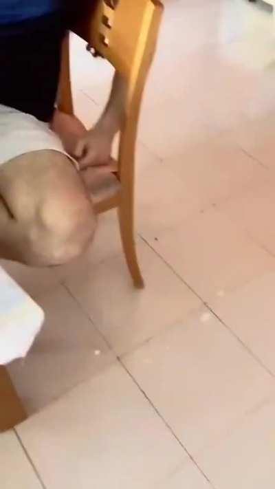 Pretending to feed the cat