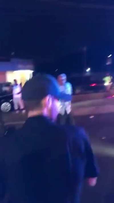 Police officers in Atlanta arrive to investigate a shooting but the crowd does not want any white officers involved in the investigation.