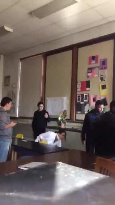 Kid hits teacher during fight and this happens