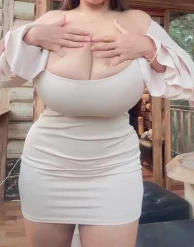 Describe my huge latina milkers, with one word