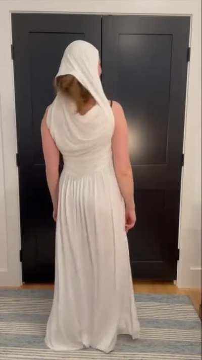 Woman tries out 'demon dress' with help from mom