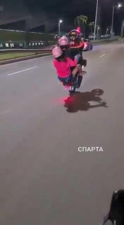 Showing off while riding a motorcycle