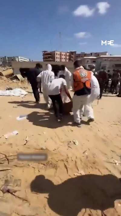 Hundreds of bodies of Palestinians were exhumed after the discovery of a mass grave at Nassir hospital in Khan Younis. The discovery comes after the Israeli military withdrew its troops from the southern city of Gaza on April 7.