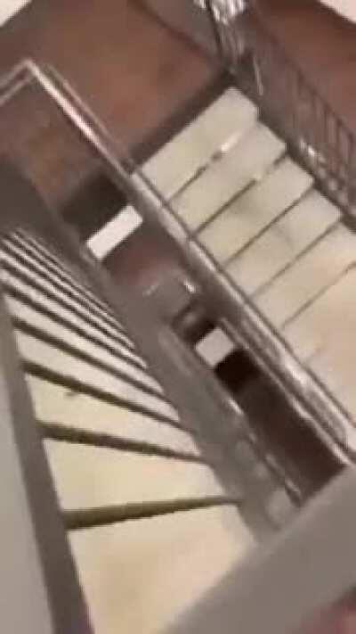 sliding down a stair handle