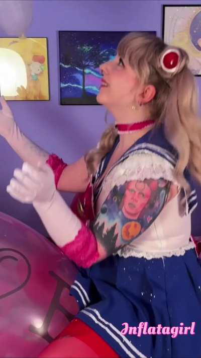 Sailor Moon playing on an airship balloon by Inflatagirlxoxo