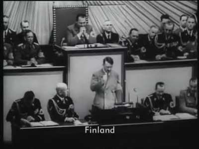 Amerikan Devlet Başkan'ı Franklin D. Roosevelt'in Hitler'den işgal etmemesini istediği ülkelerle ilgili mektup yazıyor. Hitler ise mecliste mektubu okuyor...