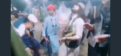 Breaking it down to some Drake while holding AK-47s