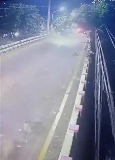 Drunk driver kills 2 people. The tricycle driver was thrown over the bridge.