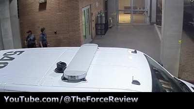 Woman rams police car into station. Officer bails out.