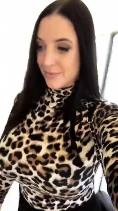 Bouncing breasts in a leopard sweater