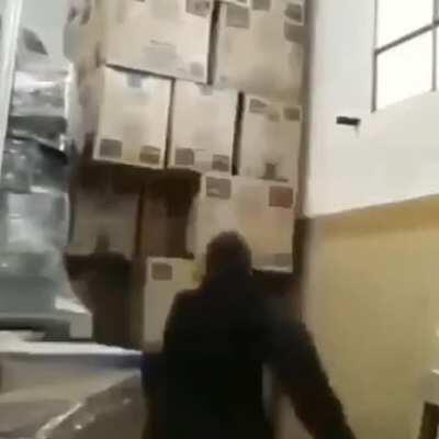 Argentine retail worker starts to play Jenga with products