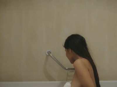 White wet saree in bathtub