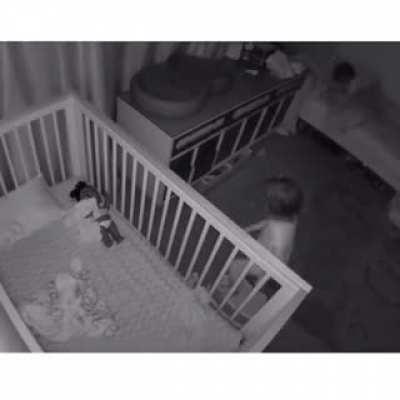 Brother helping his sister