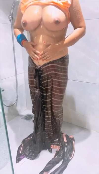 Enjoying Shower in wet Saree with uncovered huge melons, do share ur thoughts without hesitation