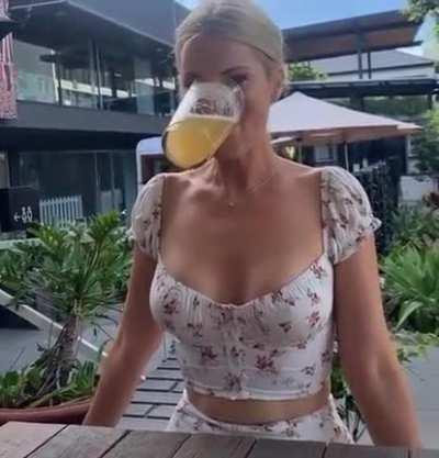 Drinking an entire glass at once without their hands.