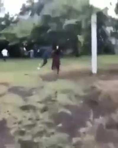 Pranked twice - friend asks for help grabbing the animal he caught.