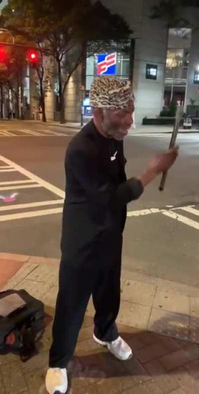 Street magician wants you to watch his wand.