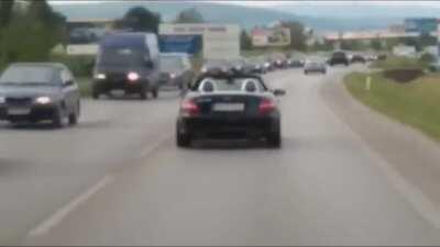 Driver was a politician from Christian-democratic movement. He later said, he was making a way for ambulance.