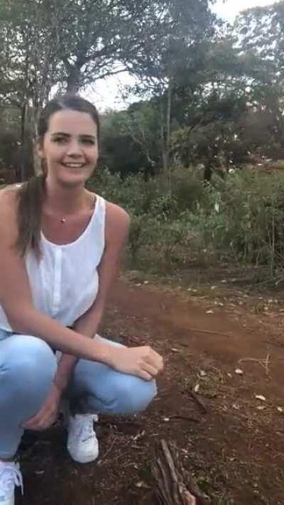 Either she's a giant or those are babies...not sure.